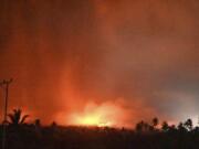 In this photo made available by Indonesia&rsquo;s Center for Volcanology and Geological Disaster Mitigation Agency (PVMBG) of the Ministry of Energy and Mineral Resources, the sky glows from the eruption of Mount Lewotobi Laki-Laki early Monday, Nov. 4, 2024, in East Flores, Indonesia.