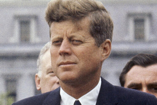 FILE - President John F. Kennedy listens while Grand Duchess Charlotte of Luxembourg speaks outside the White House, April 30, 1963, in Washington. (AP Photo/William J.