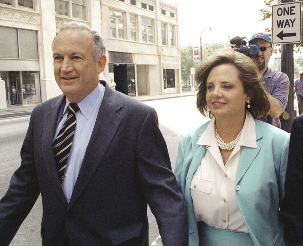 FILE - John and Patsy Ramsey, parents of JonBenet Ramsey, leave their attorney Lin Wood&#039;s offices during a break in the Ramsey&#039;s questioning by Boulder, Colo., authorities in Atlanta, Aug. 28, 2000.  (AP Photo/Gregory E.