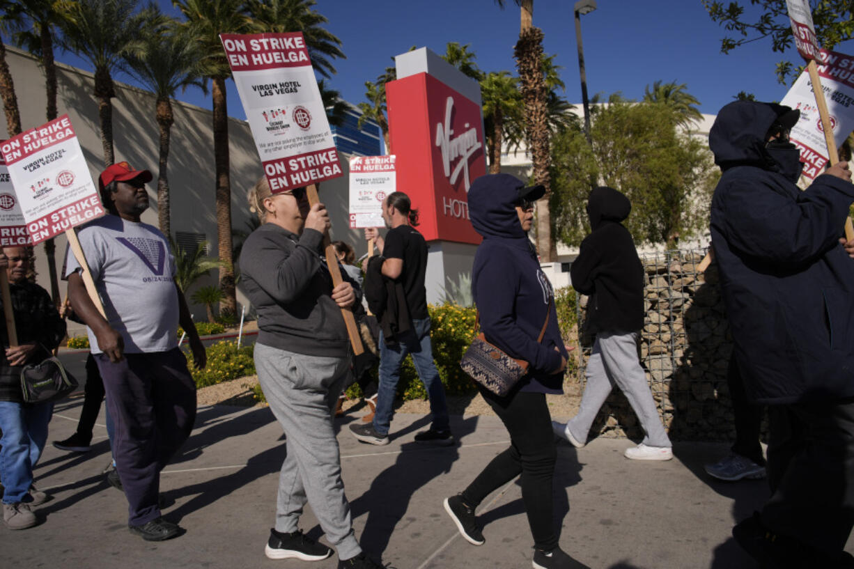 Members of the Culinary Workers Union picket in front of the Virgin Hotels Las Vegas, Friday, Nov. 15, 2024, in Las Vegas.