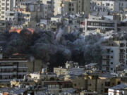 Smoke rises after an Israeli airstrike on Dahiyeh, a southern suburb of Beirut, Lebanon, on Saturday.