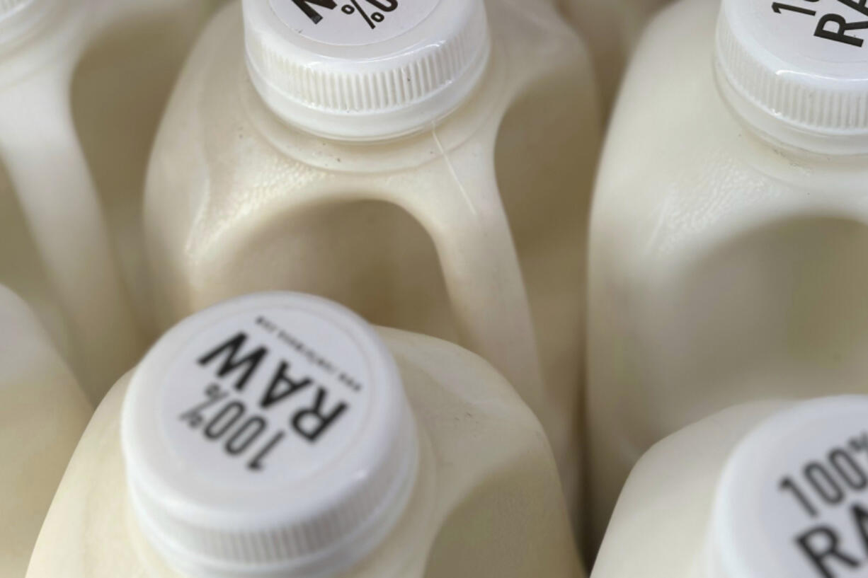 Bottles of raw milk are displayed for sale at a store in Temecula, Calif., on May.