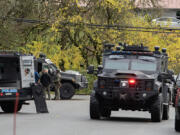 Law enforcement officers respond Nov. 14 to the scene of a shooting in Camas.