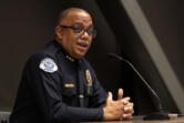 Troy Price talks to a crowd of community members Oct. 30 during a forum at Evergreen Public Schools. The city manager announced Tuesday he has appointed Price to be the next police chief.