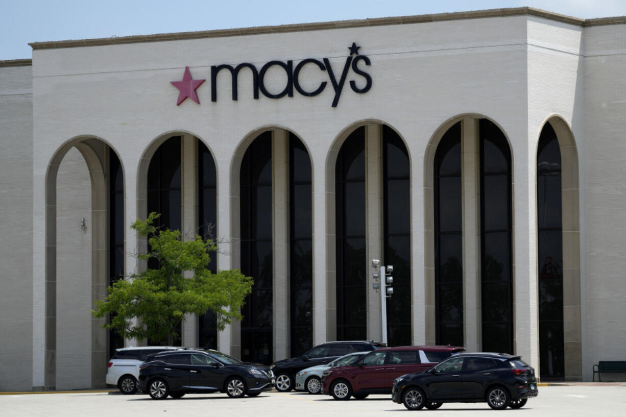 FILE - Cars are parked in front of a Macy&rsquo;s store at Hawthorn Mall in Vernon Hills, Ill., June 3, 2024. (AP Photo/Nam Y.