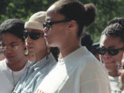 FILE - Malcolm X&#039;s daughters Malikah Shabazz, left, Attallah Shabazz, second from left, Malaak Shabazz, third from left, and Gamilah Shabazz, talk to the media outside the Jacobi Medical Center in the Bronx borough of New York, following the death of their mother, Betty Shabazz, June 23, 1997.