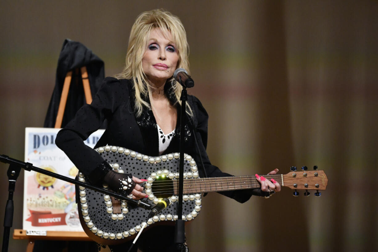 Dolly Parton appears at an event Aug. 27 to celebrate the expansion of the Imagination Library of Kentucky at the Lyric Theatre in Lexington, Ky. (Timothy D.