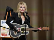 Dolly Parton appears at an event Aug. 27 to celebrate the expansion of the Imagination Library of Kentucky at the Lyric Theatre in Lexington, Ky. (Timothy D.