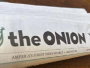 A copy of the satirical outlet The Onion is seen Thursday, Nov. 14, 2024, in Little Rock, Ark.