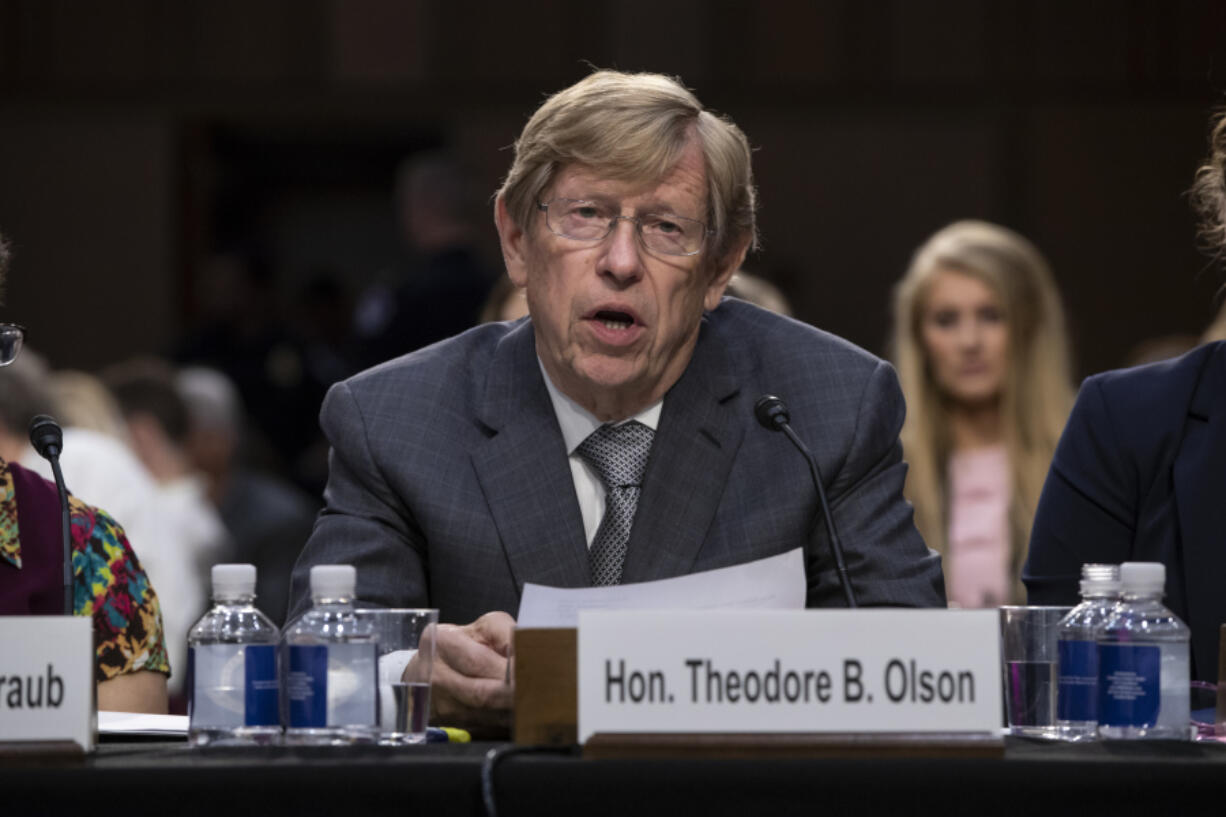 FILE - Former Solicitor General Ted Olson testifies on a panel of experts and character witnesses before the Senate Judiciary Committee on behalf of President Donald Trump&#039;s Supreme Court nominee Brett Kavanaugh on the final day of the confirmation hearings, on Capitol Hill in Washington, Sept. 7, 2018. (AP Photo/J.