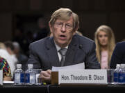 FILE - Former Solicitor General Ted Olson testifies on a panel of experts and character witnesses before the Senate Judiciary Committee on behalf of President Donald Trump&#039;s Supreme Court nominee Brett Kavanaugh on the final day of the confirmation hearings, on Capitol Hill in Washington, Sept. 7, 2018. (AP Photo/J.