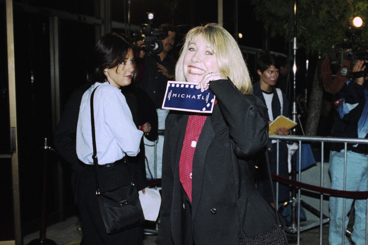 Actress Teri Garr shows off her ticket at the premiere of &ldquo;Michael,&rdquo; Dec. 19, 1996 in Beverly Hills, Calif. (Mark J.