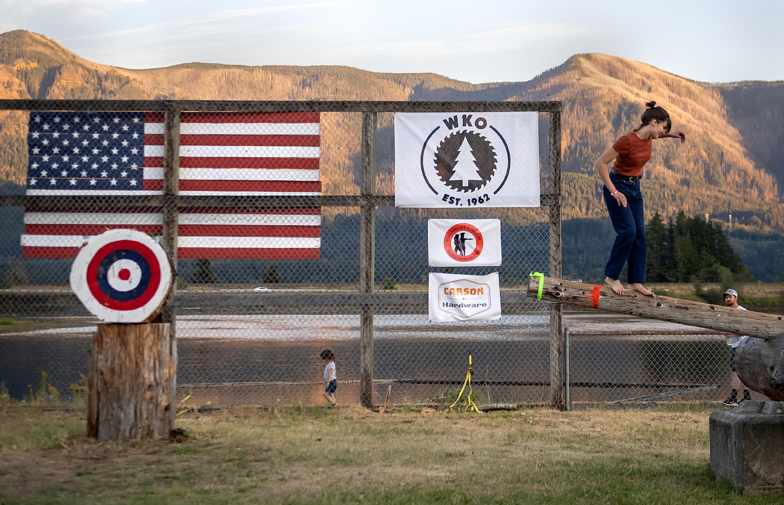 U.S. Rep. Marie Gluesenkamp Perez, D-Skamania, keeps her balance while taking part in the women's obstacle pole event during the Skamania County Timber Carnival in Stevenson on Friday, Aug. 16, 2024. Perez, who is a member of the Democratic Party, has to walk a fine line in a voting district that tends to lean Republican. “I’m in the top 3% of most bipartisan members of the U.S. House of Representatives. That’s a fact that can’t be refuted, and it’s not driven by partisan politics. It’s driven by loyalty to my community,” she said.