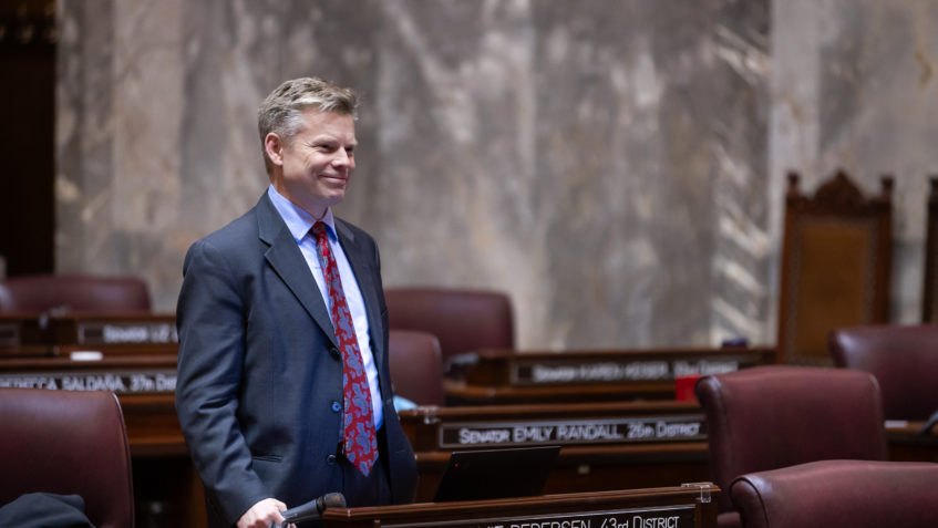 State Sen. Jamie Pedersen, D-Seattle, talks on the Senate floor in January 2024.