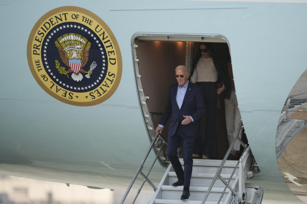 U.S. President Joe Biden deplanes in Lima, Peru, to attend the Asia-Pacific Economic Cooperation (APEC) summit, in Lima, Peru, Thursday, Nov. 14, 2024.