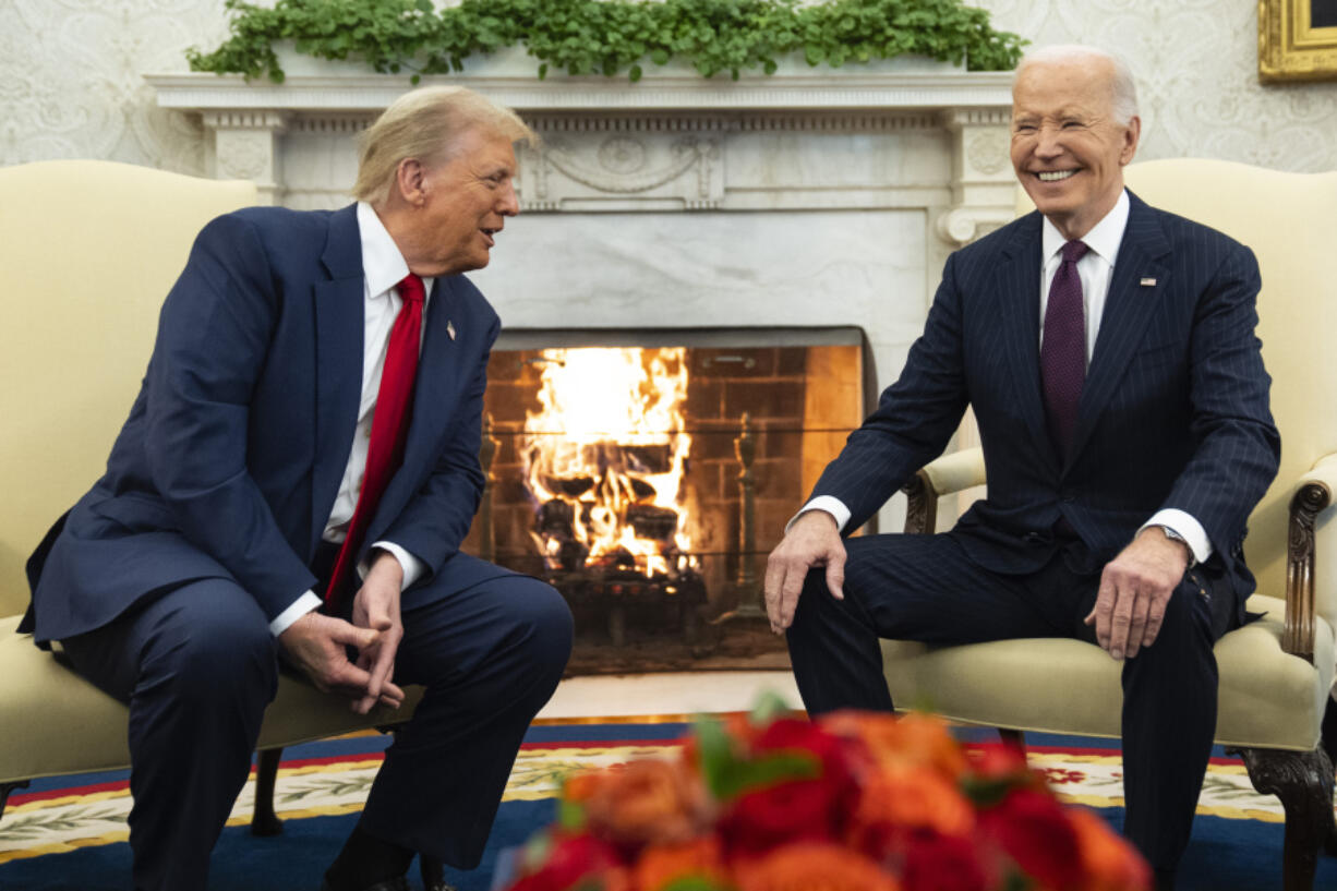 President Joe Biden, right, meets with President-elect Donald Trump in the Oval Office of the White House, Wednesday, Nov. 13, 2024, in Washington.