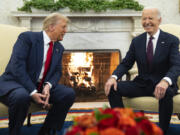 President Joe Biden, right, meets with President-elect Donald Trump in the Oval Office of the White House, Wednesday, Nov. 13, 2024, in Washington.