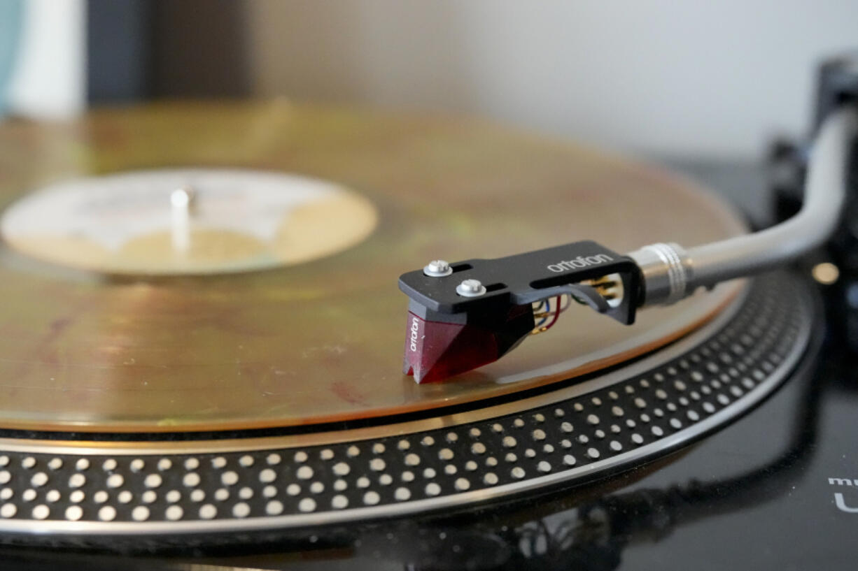 A vinyl record is seen at United Record Pressing, July 11, 2024, in Nashville, Tenn.