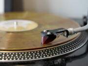 A vinyl record is seen at United Record Pressing, July 11, 2024, in Nashville, Tenn.