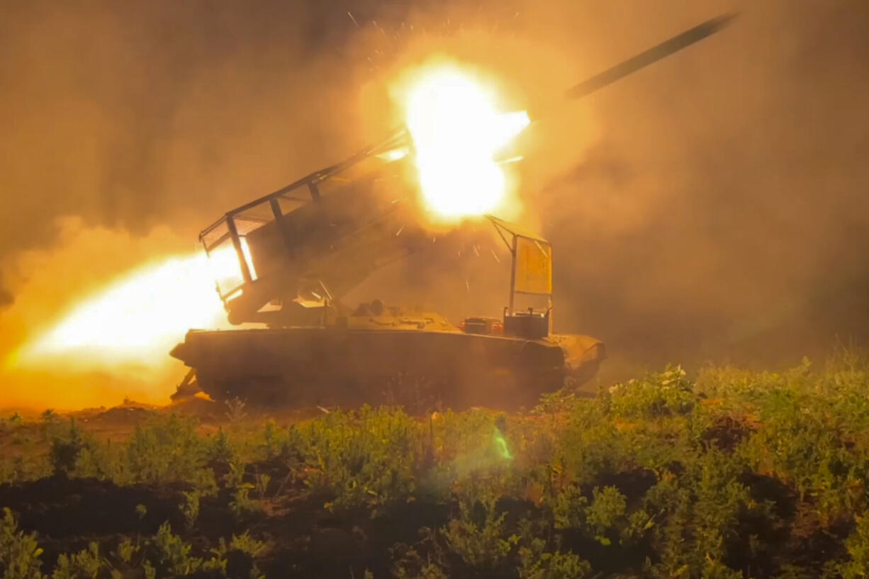 In this photo taken from a video released by Russian Defense Ministry press service on Wednesday, Nov. 13, 2024, the Russian army&rsquo;s multiple rocket launcher Solntsepyok fires towards Ukrainian positions in the border area of Kursk region, Russia.