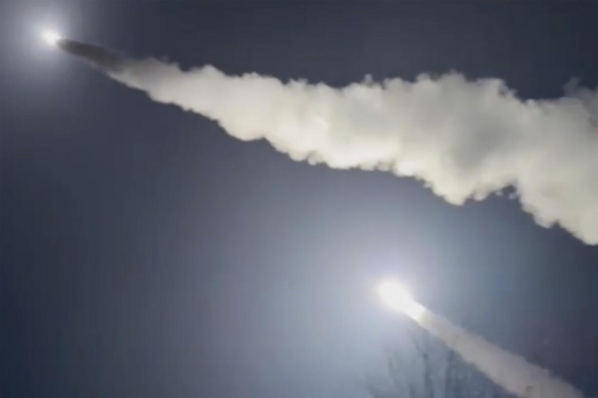 This image was made from a video posted by a Telegram channel affiliated with the Ukrainian military on Tuesday, Nov. 19, 2024. The channel says it shows U.S.-supplied ATACMS missiles being fired from an undisclosed location in Ukraine. The Associated Press cannot independently verify the date and location the video was filmed.