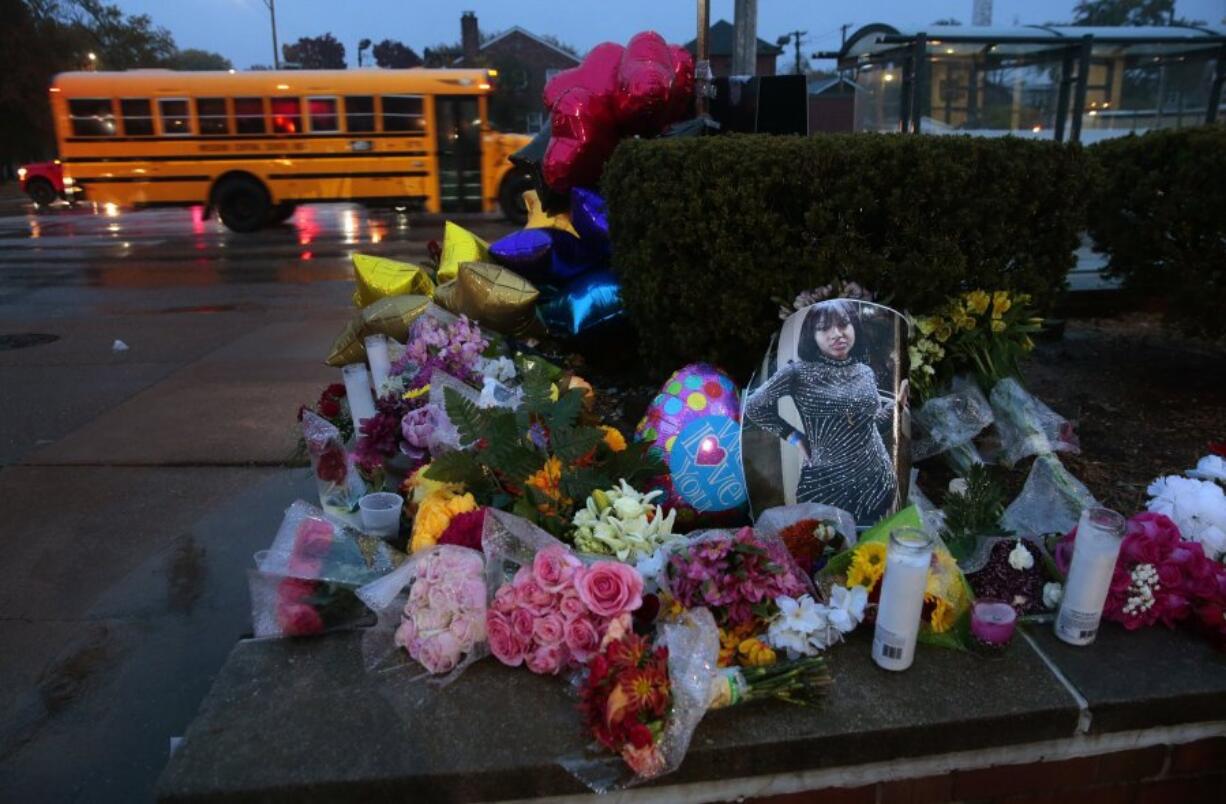 A photo of Alexandria Bell rests amid a memorial to the victims of a school shooting at Central Visual and Performing Arts High School in St. Louis on Oct. 25, 2022. (Robert Cohen/St.