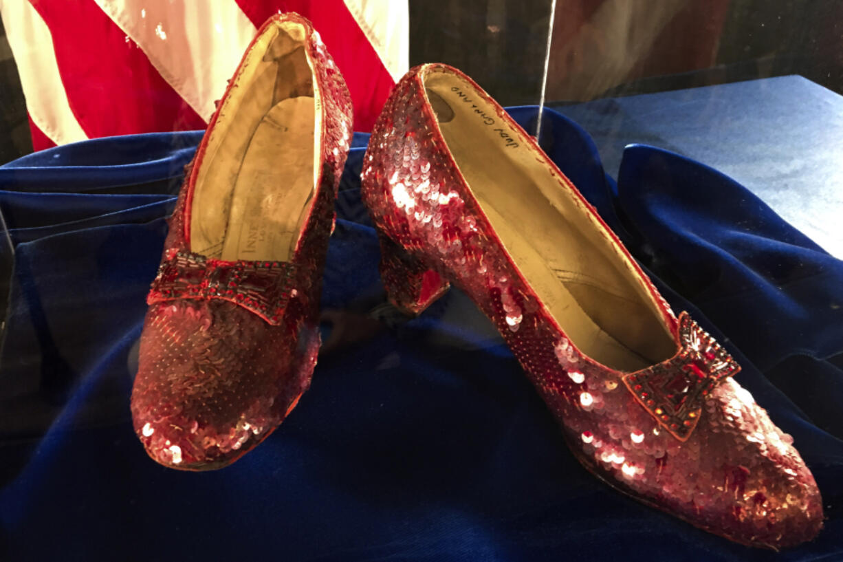 FILE - Ruby slippers once worn by Judy Garland in the &quot;The Wizard of Oz,&quot; are displayed at a news conference, Sept. 4, 2018, at the FBI office in Brooklyn Center, Minn.