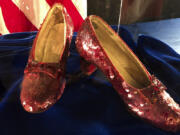 FILE - Ruby slippers once worn by Judy Garland in the &quot;The Wizard of Oz,&quot; are displayed at a news conference, Sept. 4, 2018, at the FBI office in Brooklyn Center, Minn.