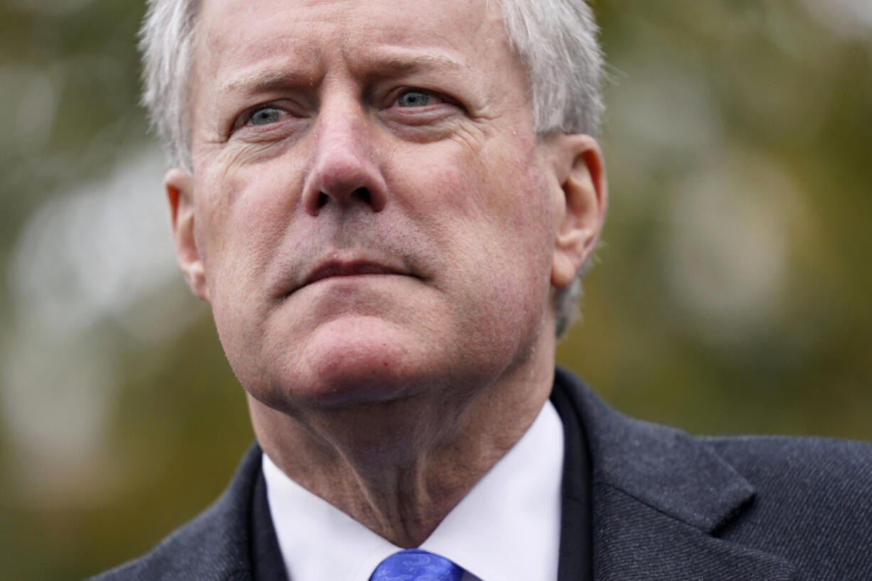 FILE - White House chief of staff Mark Meadows speaks with reporters outside the White House, Oct. 26, 2020, in Washington.