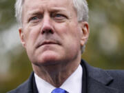 FILE - White House chief of staff Mark Meadows speaks with reporters outside the White House, Oct. 26, 2020, in Washington.