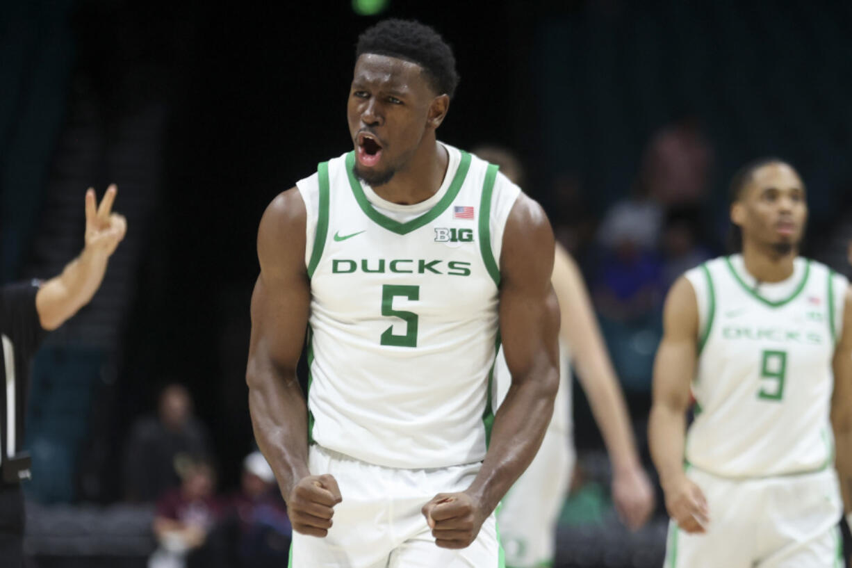 Oregon guard TJ Bamba (5) yells after being fouled during the second half of an NCAA basketball game against Texas A&amp;M Tuesday, Nov. 26, 2024, in Las Vegas.