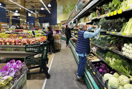 FILE - Customers shop at a grocery store in Chicago, Oct. 25, 2024. (AP Photo/Nam Y.