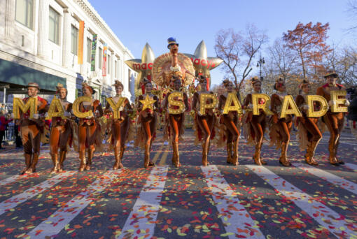 FILE - Parade performers lead the Tom Turkey float down Central Park West at the start of the Macy&#039;s Thanksgiving Day parade on Nov. 23, 2023, in New York.