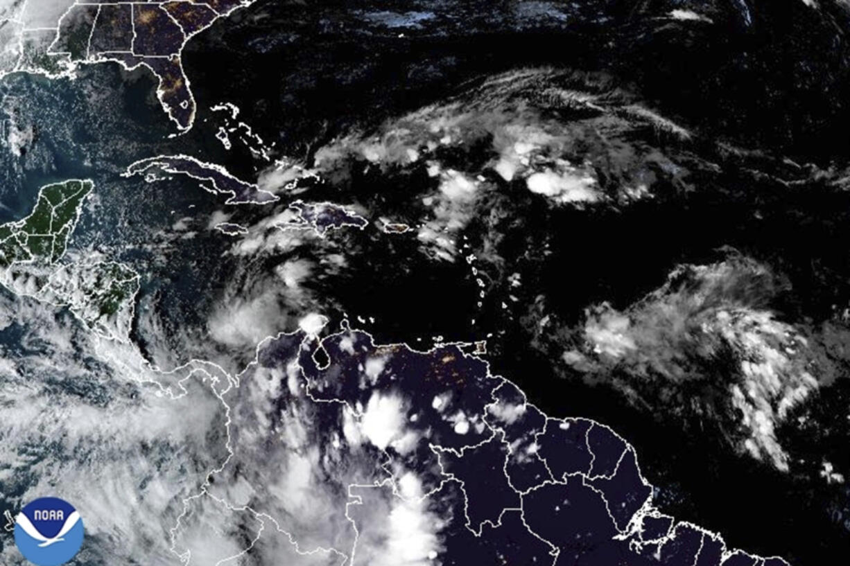 This satellite image provided by NOAA shows weather systems Sunday, Nov. 3, 2024.