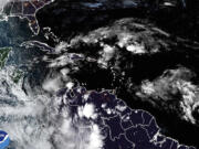 This satellite image provided by NOAA shows weather systems Sunday, Nov. 3, 2024.