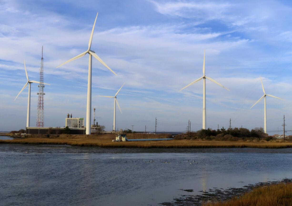 Land-based wind turbines spin Wednesday in Atlantic City, N.J.