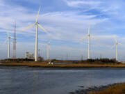 Land-based wind turbines spin Wednesday in Atlantic City, N.J.