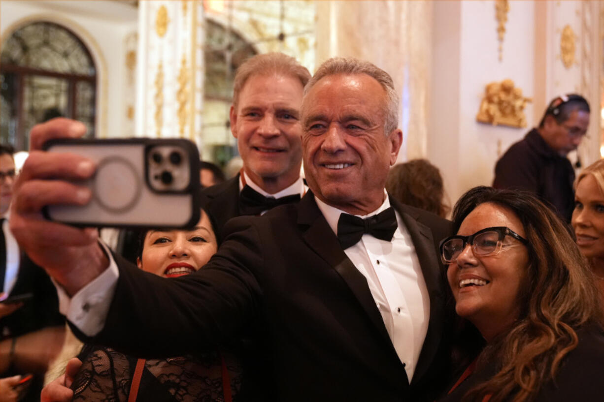 Robert F. Kennedy Jr. arrives before President-elect Donald Trump speaks during an America First Policy Institute gala at his Mar-a-Lago estate Nov. 14 in Palm Beach, Fla.