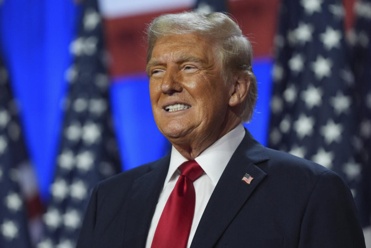 Republican presidential nominee former President Donald Trump smiles at an election night watch party at the Palm Beach Convention Center, Wednesday, Nov. 6, 2024, in West Palm Beach, Fla.