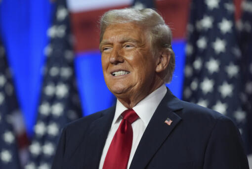 Republican presidential nominee former President Donald Trump smiles at an election night watch party at the Palm Beach Convention Center, Wednesday, Nov. 6, 2024, in West Palm Beach, Fla.