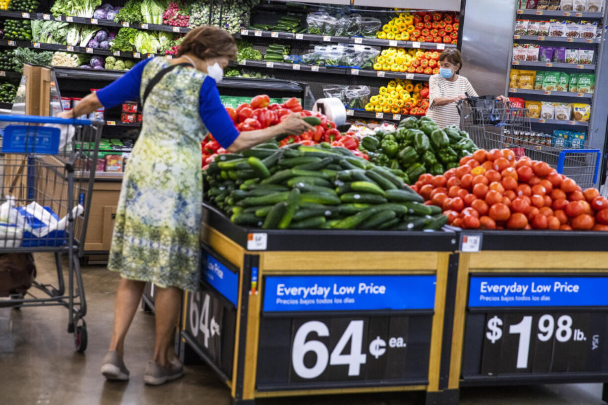 FILE - People buy groceries at a Walmart Superstore in Secaucus, New Jersey, July 11, 2024.