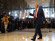 FILE - Former President Donald Trump gestures as he leaves after speaking at a news conference at Trump Tower, Friday, May 31, 2024, in New York.