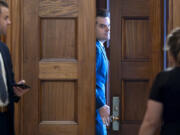 FILE - President-elect Donald Trump&#039;s nominee to be attorney general, former Rep. Matt Gaetz, R-Fla., closes a door to a private meeting with Vice President-elect JD Vance and Republican Senate Judiciary Committee members, at the Capitol in Washington, Nov. 20, 2024. (AP Photo/J.