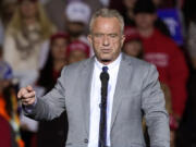 FILE - Robert F. Kennedy Jr., speaks before Republican presidential nominee former President Donald Trump at a campaign event Nov. 1, 2024, in Milwaukee.