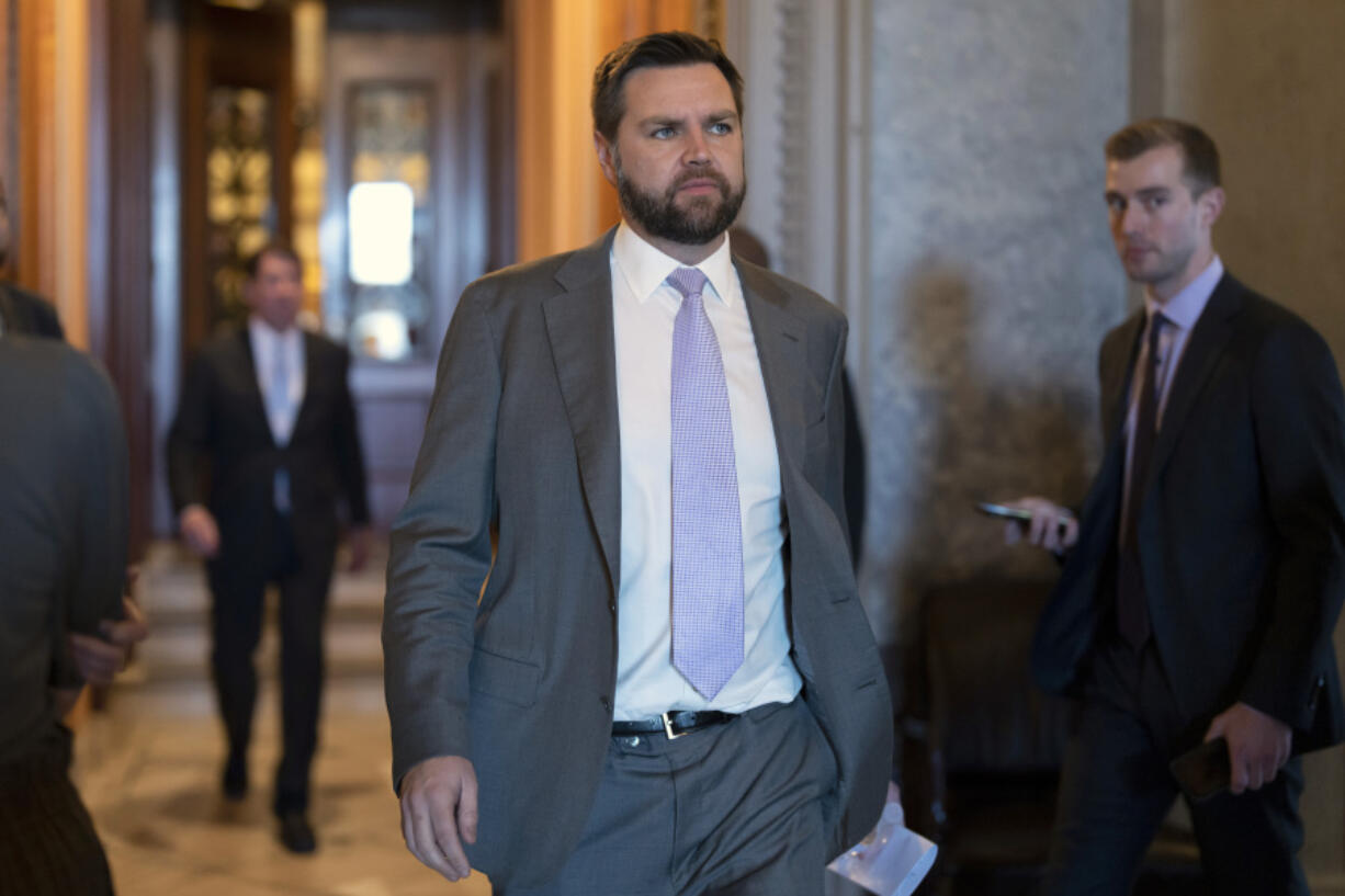 FILE - Sen. JD Vance, R-Ohio, departs the chamber at the Capitol in Washington, March 15, 2023. (AP Photo/J.