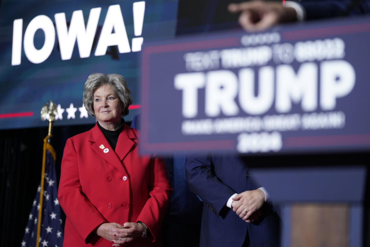 FILE - Susie Wiles watches as Republican presidential candidate former President Donald Trump speaks at a caucus night party in Des Moines, Iowa, Jan. 15, 2024.