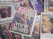 Britain&rsquo;s newspapers&rsquo; front pages reporting on U.S. President-elect Donald Trump in the U.S. presidential election, are seen in London, Thursday, Nov. 7, 2024.