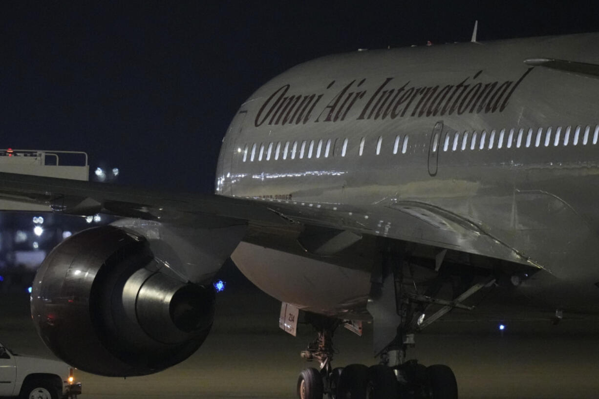 A plane with three American citizens, Mark Swidan, Kai Li and John Leung who were imprisoned for years by China, arrives at Joint Base San Antonio Lackland, in San Antonio, Wednesday, Nov. 27, 2024.