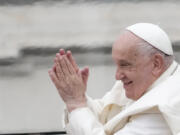 Pope Francis waves as he leaves after his weekly general audience in St. Peter&rsquo;s Square at The Vatican, Wednesday, Nov.20, 2024.