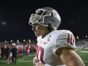 Washington State&#039;s quarterback John Mateer walks off the field after losing to New Mexico during an NCAA college football game Saturday, Nov. 16, 2024 in Albuquerque, N.M. (AP Photo/Roberto E.